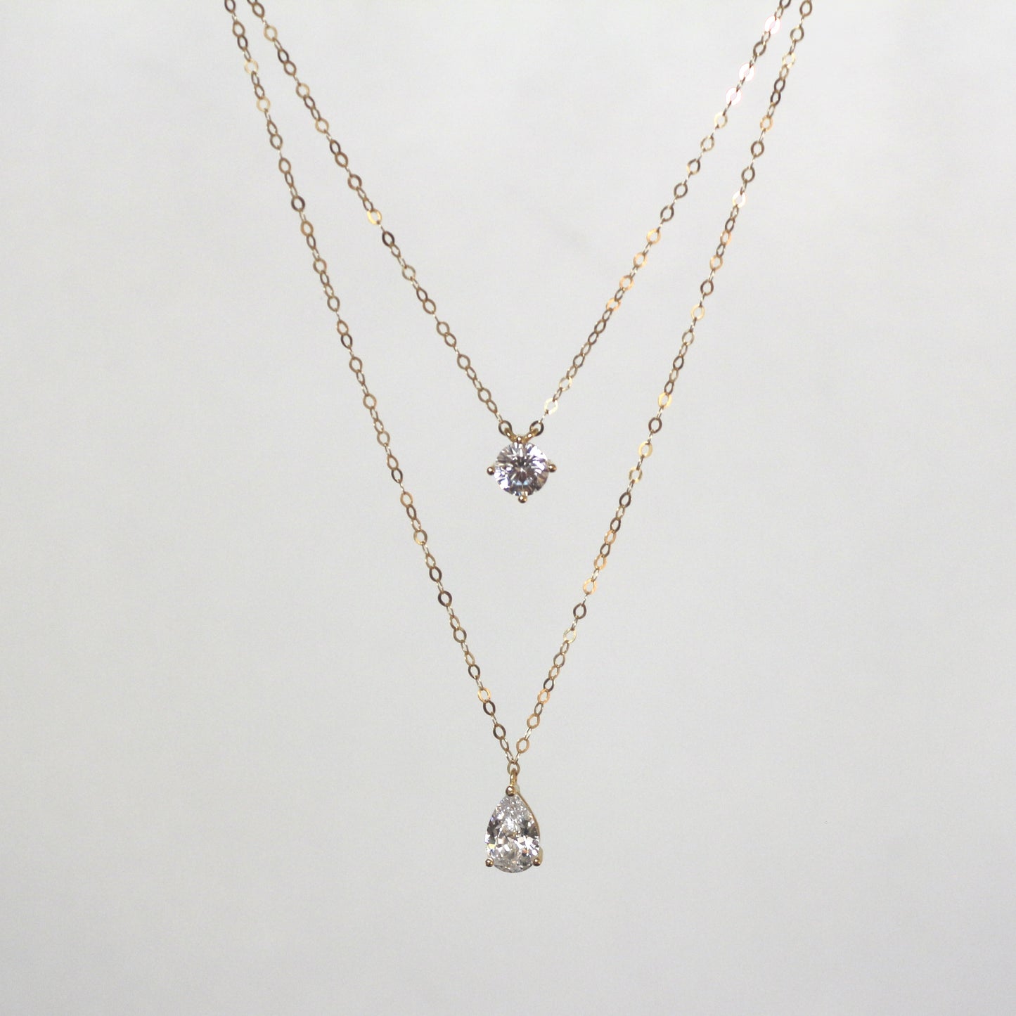 Double Layered Round and Teardrop Zircon Necklace