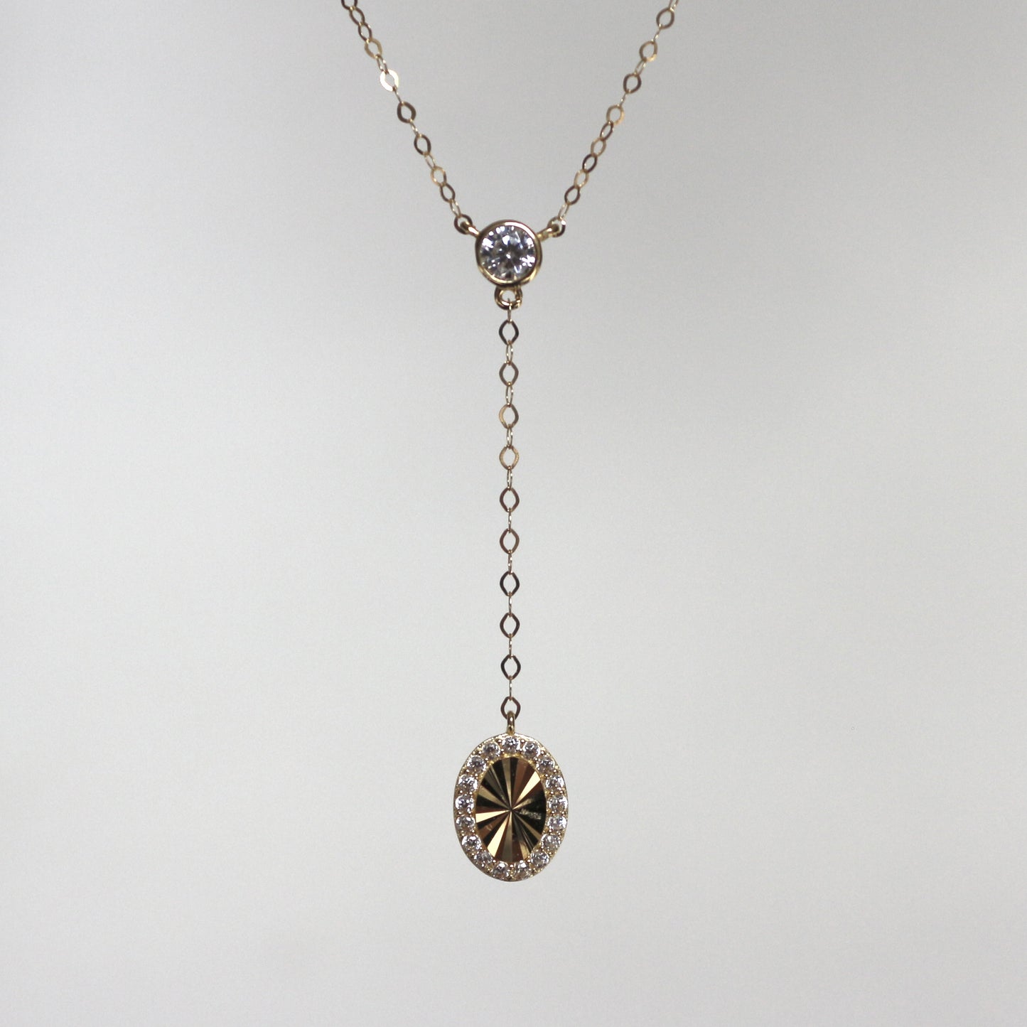 Zircon Necklace with Sunburst Charm