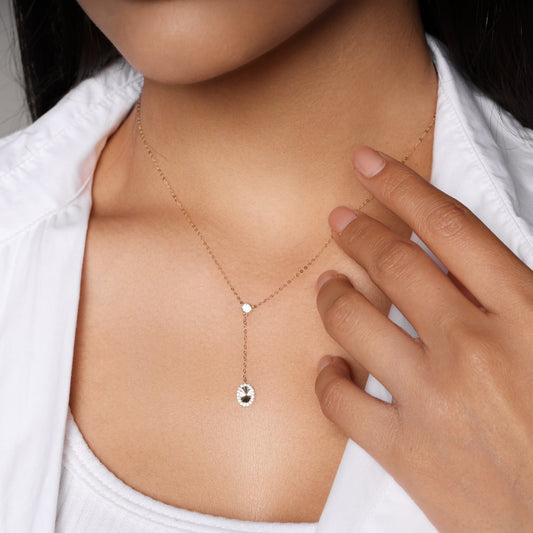 Zircon Necklace with Sunburst Charm